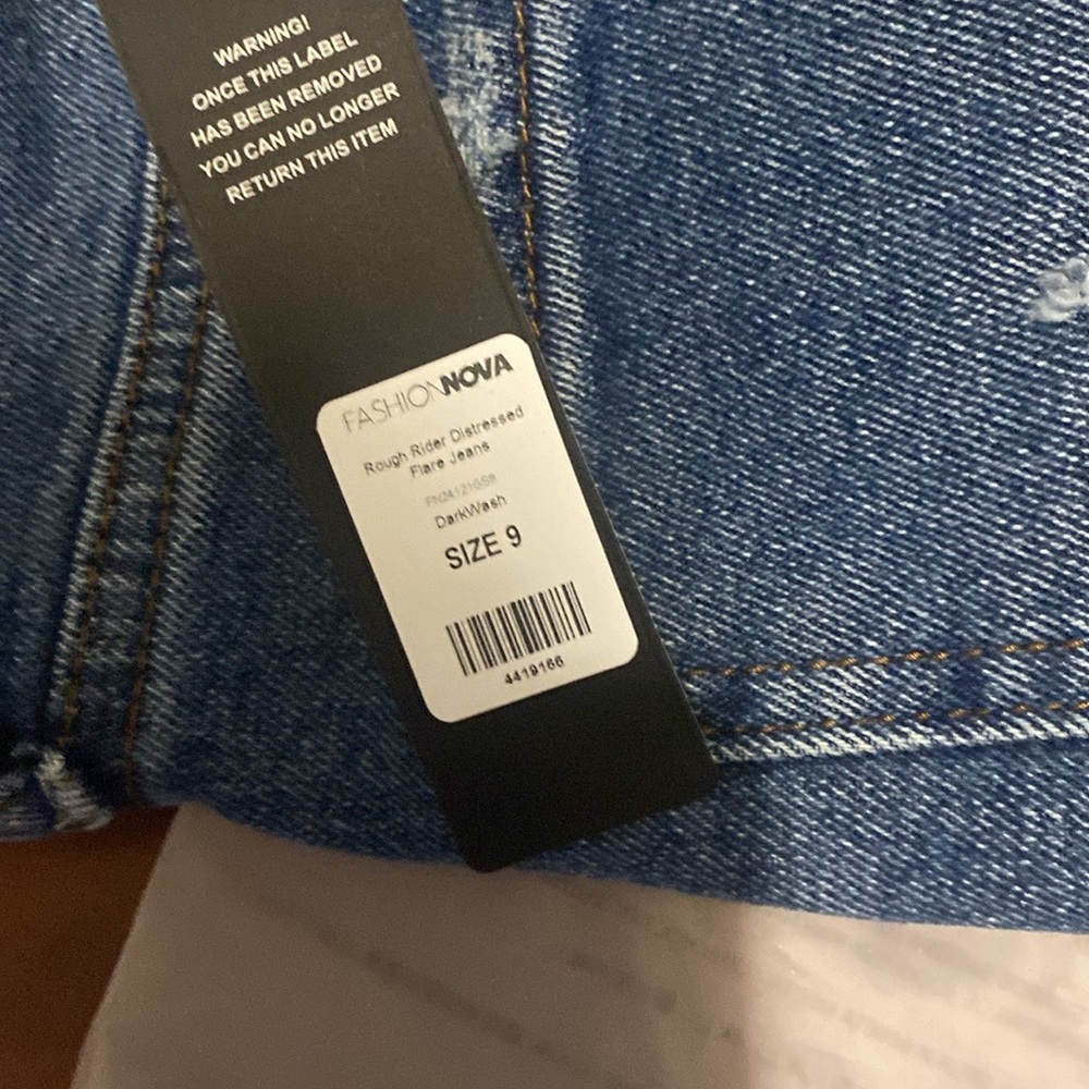 Rough rider distressed flare jeans